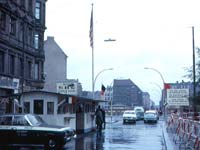 Checkpoint Charlie in 1963 (© Roger Wollstadt, CC BY-SA 2.0)