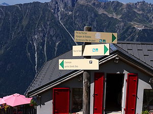 Trail signs at the Refuge du Plan de l'Aiguille