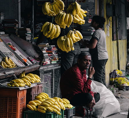 A man selling bananas in Pune, India