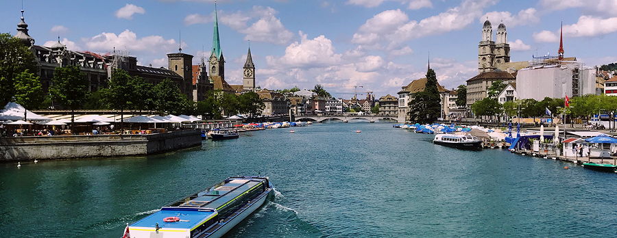 The Limmat in Zurich, looking downstream to Rathausbruecke from Quaibruecke at Lake Zurich, Stadthausquai to the left and Limmatquai to right.