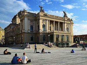 People enjoying a sunny day in front of the Opera House