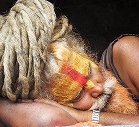 A snoozing Tibetan Monk